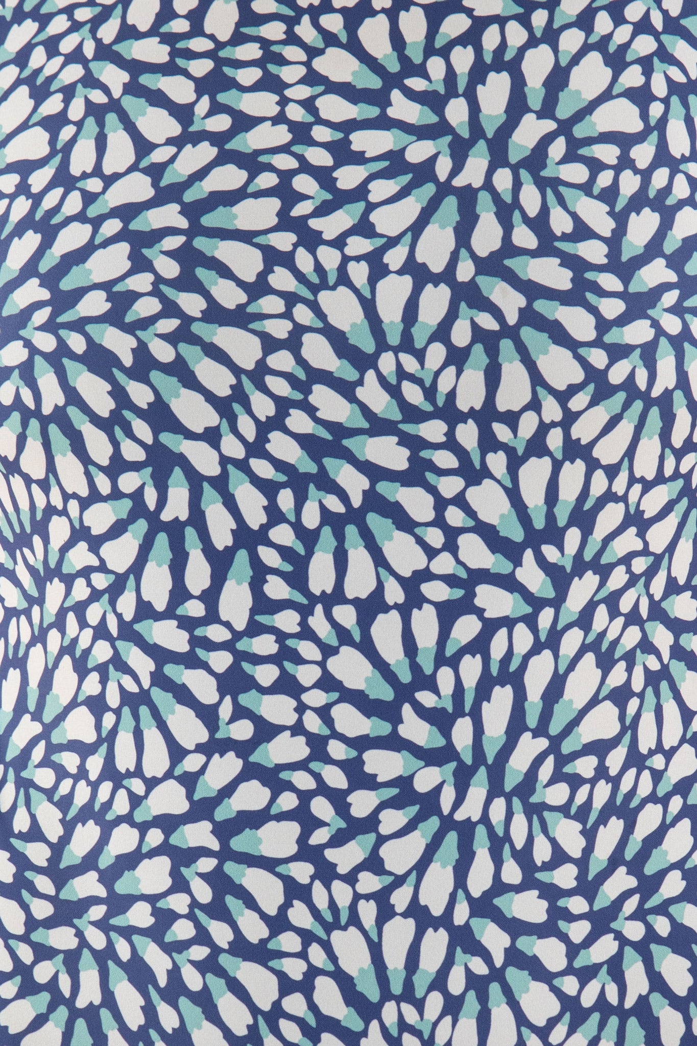 Detailed view of the abstract blue design on the Ketut Backless One-Piece Surf Spring Suit