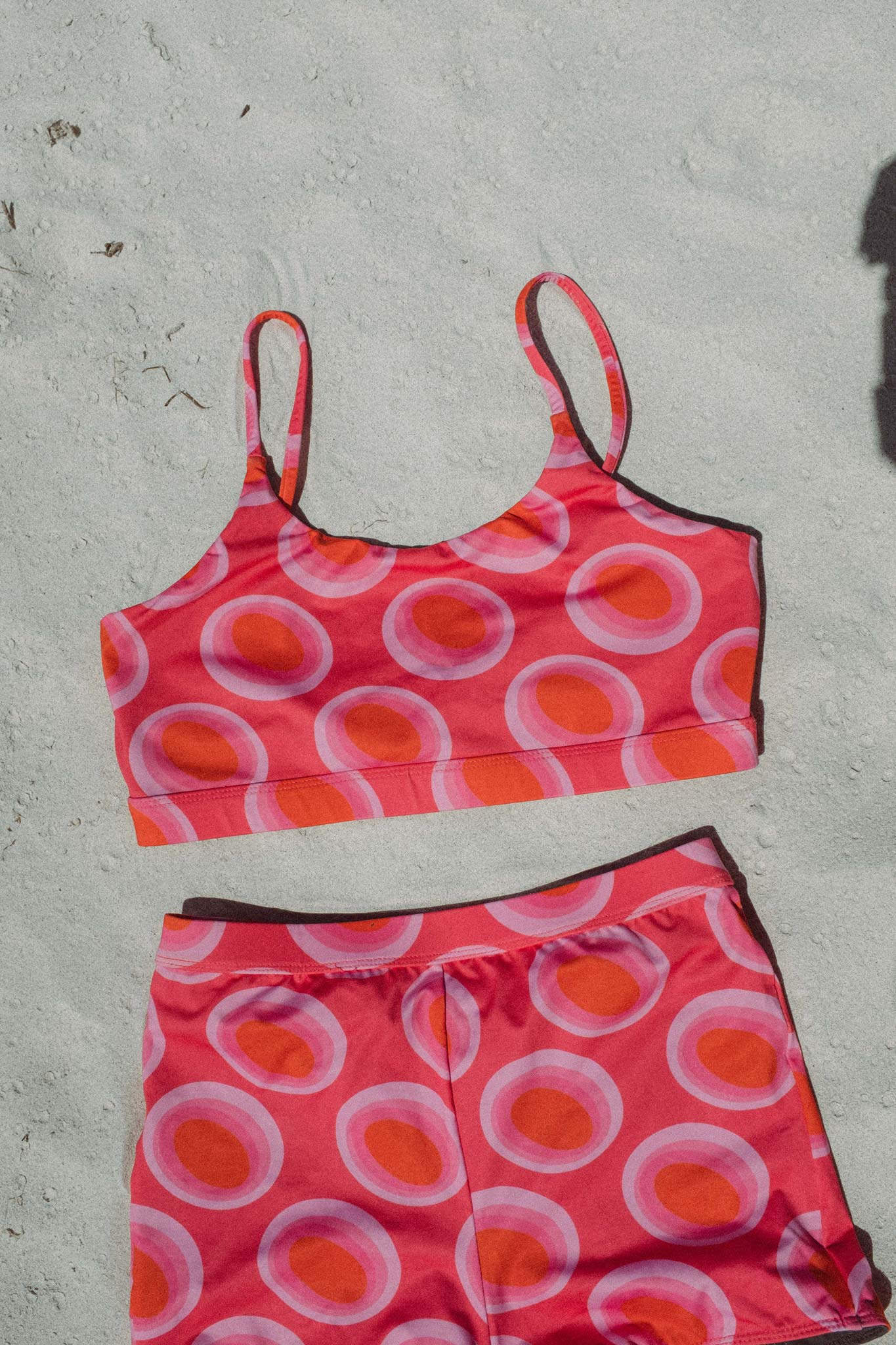 flatlay of the watermelon surf bikini top